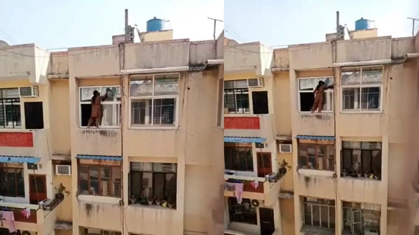 Ghaziabad Viral Video- Women hanging from the fourth floor cleaning the Window